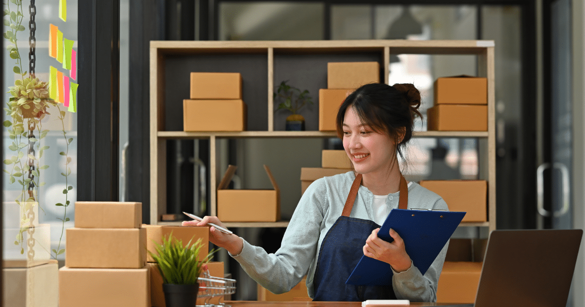 Business owner managing inventory and finances in a Florida shop, exploring bad credit loan options for growth.