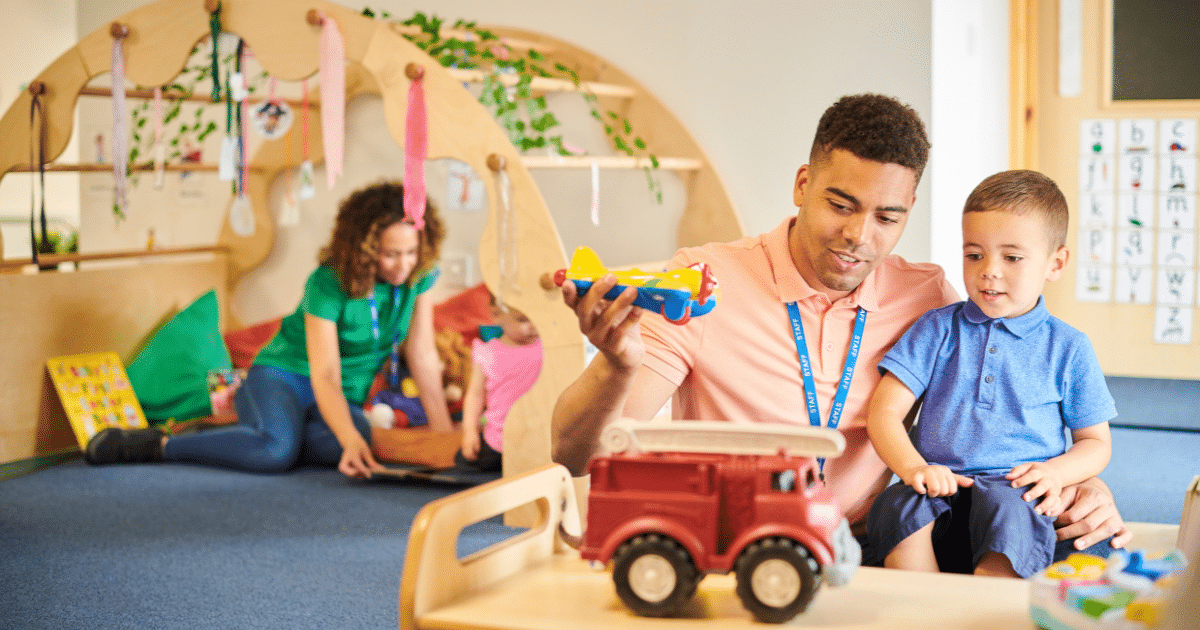 Child day care provider engaging with children, showcasing flexible bad credit business loans for child care services.