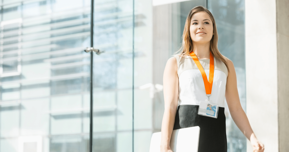 Professional woman with a business toolkit, representing essential resources for small business owners and entrepreneurs.