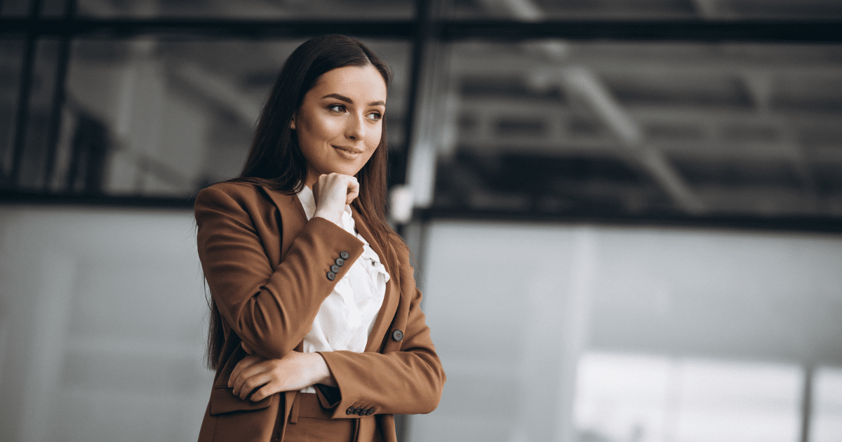 Businesswoman contemplating strategies to transform social media followers into profits for small businesses.
