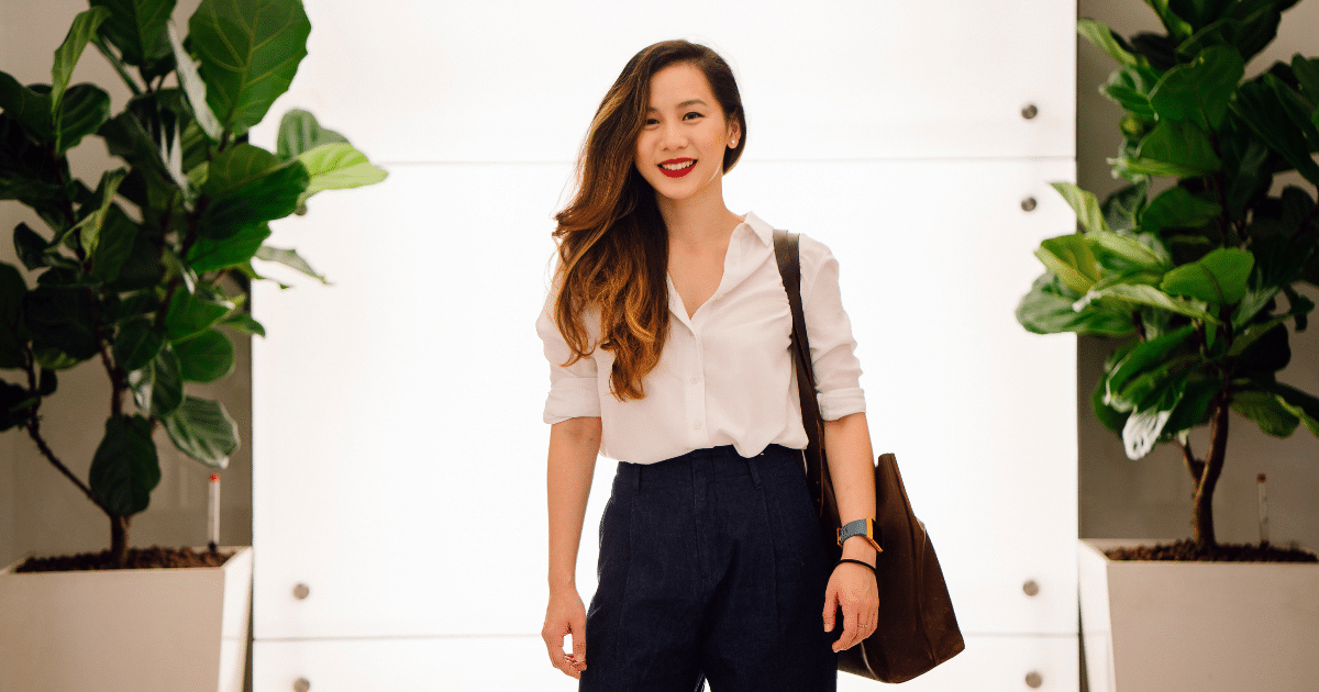 Professional woman in a modern setting, showcasing business image and credibility for small business growth.