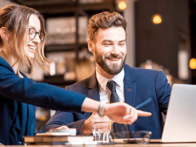 Business professionals engaging with online influencers to build connections and enhance brand visibility.