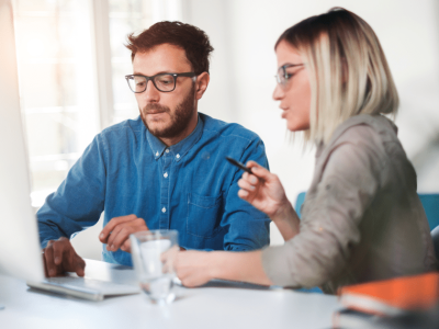 Business professionals discussing fast approval unsecured credit lines for small businesses in a modern office setting.